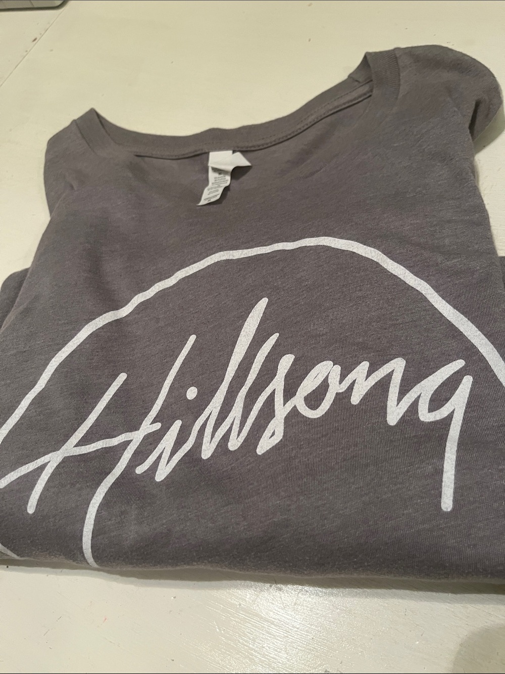 Hillsong Women’s Charcoal Tee with White Script Logo